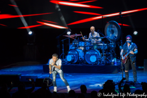 Arnel Pineda, Neal Schon and Steve Smith of Journey performing live at Starlight Theatre in Kansas City, MO on July 22, 2017.