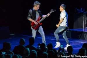 Original bass player Ross Valory with frontman Arnel Pineda of Journey live at Starlight Theatre in Kansas City, MO on July 22, 2017.