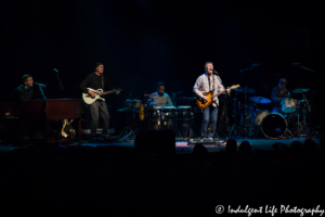 Steve Winwood in concert with band members José Neto, Edwin Sanz, Paul Booth and Richard Bailey at Uptown Theater in Kansas City, MO on March 2, 2018.