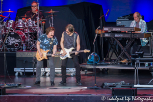 Lead singer Tom Johnston and guitarist John McFee with drummer Ed Toth and keyboardist Bill Payne of The Doobie Brothers performing live at Starlight Theatre in Kansas City, MO on June 18, 2018.