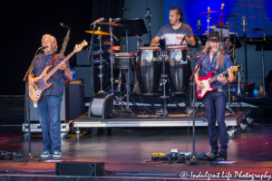 Guitarist Patrick Simmons with bassist John Cowan and percussionist Marc Quiñones of The Doobie Brothers performing live at Starlight Theatre in Kansas City, MO on June 18, 2018.