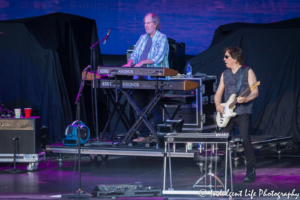 Guitar player John McFee with keyboardist Bill Payne of The Doobie Brothers performing live at Starlight Theatre in Kansas City, MO on June 18, 2018.