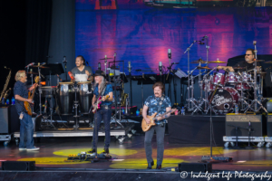 Lead singer Tom Johnston and guitarist Patrick Simmons with bass player Bill Payne, drummer Ed Toth and percussionist Marc Quiñones of The Doobie Brothers live at Starlight Theatre in Kansas City, MO on June 18, 2018.