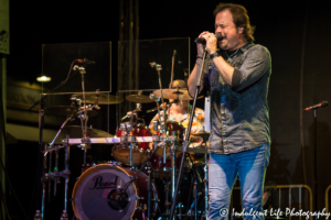 Restless Heart frontman Larry Stewart performing live with drummer John Dittrich at Festival on the Trails in Gardner, KS on June 9, 2018.