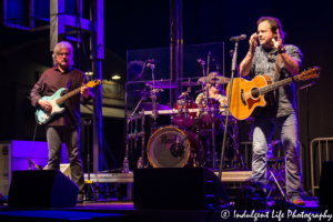 Lead singer Larry Stewart with drummer John Dittrich and guitarist Greg Jennings of Restless Heart performing live at Festival on the Trails in Gardner, KS on June 9, 2018.