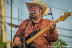 Bass guitarist Shane Mullins of Ricochet live in concert at Festival on the Trails in Gardner, KS on June 9, 2018.