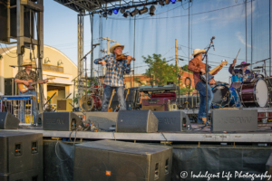 Country music group Ricochet performing live in concert at Festival on the Trails in Gardner, KS on June 9, 2018.