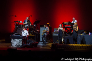 Steely Dan lead singer Donald Fagen with bass guitarist Freddie Washington, drummer Keith Carlock, the Danettes and Steely Dan keyboardist at Starlight Theatre in Kansas City, MO on June 18, 2018.