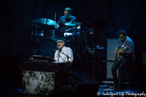 Lead singer Donald Fagen and Steely Dan band members Freddie Washington on bass guitar and Keith Carlock on drums at Starlight Theatre in Kansas City, MO on June 18, 2018.