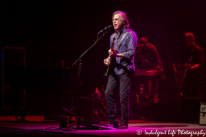 Jackson Browne live in concert with bass guitar player Bob Glaub and keyboardist Jeff Young at Music Hall in Kansas City, MO on June 24, 2018.