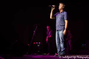 Lonestar lead singer Richie McDonald performing with guitarist Michael Britt and bass player Robby Wilson at Ameristar Casino in Kansas City, MO on June 28, 2018.