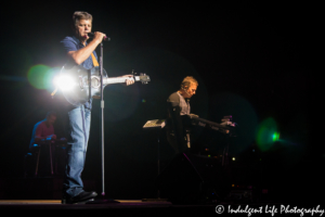 Lead singer Richie McDonald of Lonestar peforming with keyboardist Dean Same and steel guitar player Brad Corbin at Ameristar Casino Hotel Kansas City on June 28, 2018.