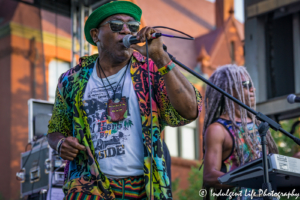 Ras Neville performing live with keyboardist Edward Turner at Live on Mass in Lawrence, KS on June 29, 2018.