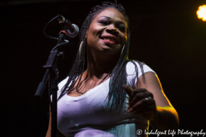 Backup singer for The Wailers performing at Live on Mass in downtown Lawrence, KS on June 29, 2018.