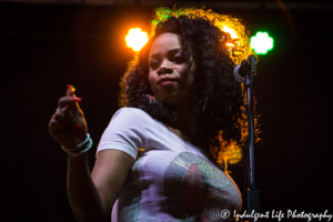 The Wailers backup singer in concert at Live on Mass in downtown Lawrence, KS on June 29, 2018.