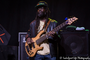 The Wailers bass guitarist Aston "Familyman" Barrett performing at the Live on Mass event in downtown Lawrence, KS on June 29, 2018.