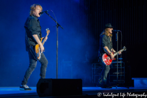 Bass player Jeff Pilson and guitarist Tom Gimbel of Foreigner in concert at Starlight Theatre in Kansas City, MO on July 17, 2018.