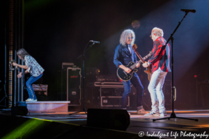 Foreigner founder Mick Jones, guitarist Bruce Watson and lead singer Kelly Hansen performing live at Starlight Theatre in Kansas City, MO on July 17, 2018.