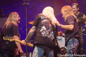 Bret Michaels bandmates taking the stage at Star Pavilion inside of Ameristar Casino Hotel Kansas City on September 15, 2018.