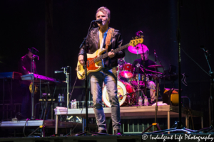 Exile band members Sonny LeMaire, Marlon Hargis and Steve Goetzman performing together at Johnson County Old Settlers in Olathe, KS on September 8, 2018.