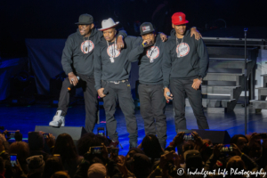 New Edition member Bobby Brown, Ricky Bell, Mike Bivins and Ronnie DeVoe addressing the crowd on its "4 the Love of It" concert tour stop at Kansas City's Starlight Theatre on May 9, 2019.