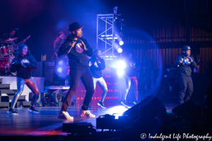 RBRM members Ronnie DeVoe and Mike Bivins performing with backup dancers at Kansas City's Starlight Theatre on May 9, 2019.