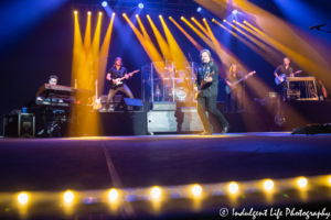 Travis Tritt strutting across the stage during his "Outlaws & Renegades" concert tour stop at SEC Arena in Independence, MO on May 25, 2019.