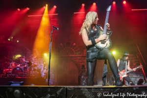 Guitarists Nita Strauss and Tommy Henriksen with drummer Glen Sobel of Alice Cooper's band performing live at Starlight Theatre in Kansas City, MO on July 26, 2019.