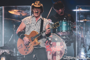 Guitarist Ted Nugent performing with drummer Jason Hartless at Star Pavilion inside of Ameristar Casino in Kansas City, MO on August 2, 2019.