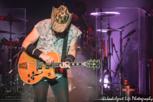 Ted Nugent playing the guitar with Jason Hartless on drums at Ameristar Casino in Kansas City, MO on August 2, 2019.