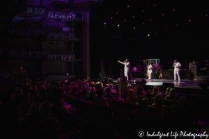 Tenor Shawn Stockman on lead vocals with fellow Boyz II Men members Nathan and Wanya Morris at Kauffman Center for the Performing Arts on October 2, 2019.