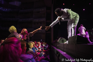 Fan reaches out to touch Boyz II Men singer Shawn Stockman's hand at the Kauffman Center in Kansas City, MO on October 2, 2019.