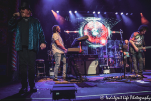 Lead vocalist Joseph Williams singing with Toto members at Kansas City's Uptown Theater on September 27, 2019.