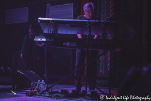 Toto keyboardist Steve Porcaro performing live as frontman Joseph Williams watches the band at Uptown Theater in Kansas City, MO on September 27, 2019.