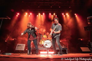 Guitarist Chet Galloway and violin player Janet Jameson of Shooting Star performing live with Steve Thomas at Ameristar Casino in Kansas City, MO on November 23, 2019.