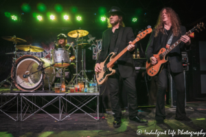 Members Dave McCluskey, Nick Mailing and Paul Guerin of The Quireboys performing together at the Aftershock in Merriam, KS on March 8, 2020.