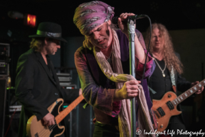 Lead singer Spike of The London Quireboys performing with members Nick Mailing and Paul Guerin at the Aftershock in Merriam, KS on March 8, 2020.