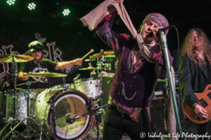 The Quireboys lead vocalist Spike in concert with drummer Dave McCluskey and guitarist Paul Guerin at the Aftershock in Merriam, KS on March 8, 2020.