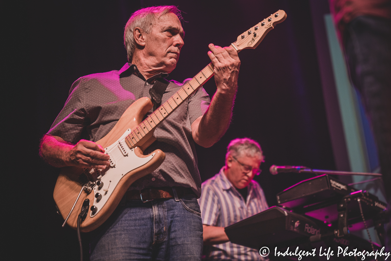 Rhythm guitarist and singer Nick Sibley with keyboard player Kelly Brown of the Ozark Mountain Daredevils live at Ameristar Casino in Kansas City, MO on August 21, 2021.