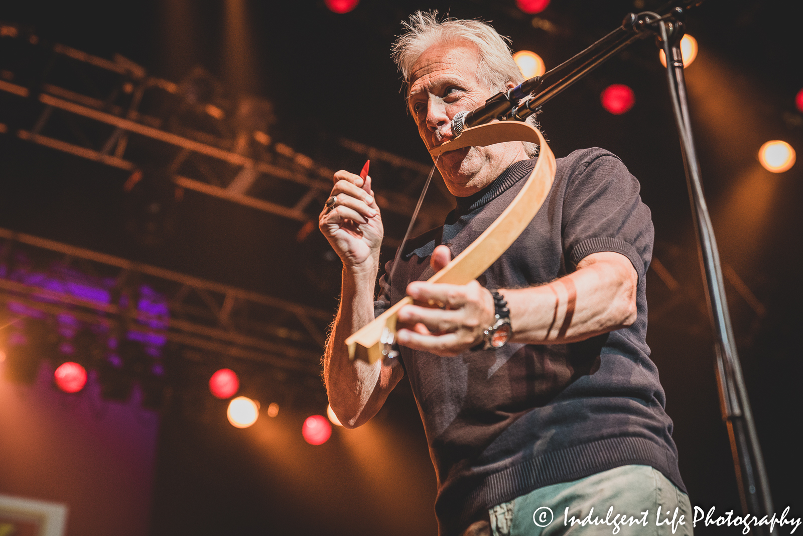 Lead singer and founder John Dill of the Ozark Mountain Daredevils playing the musical bow at Ameristar Casino Hotel Kansas City on August 21, 2021.