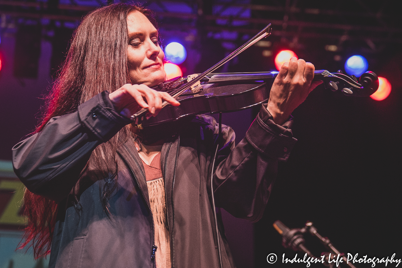 Newest member and violinist Molly Healey of the Ozark Mountain Daredevils performing live at Ameristar Casino's Star Pavilion in Kansas City, MO on August 21, 2021.