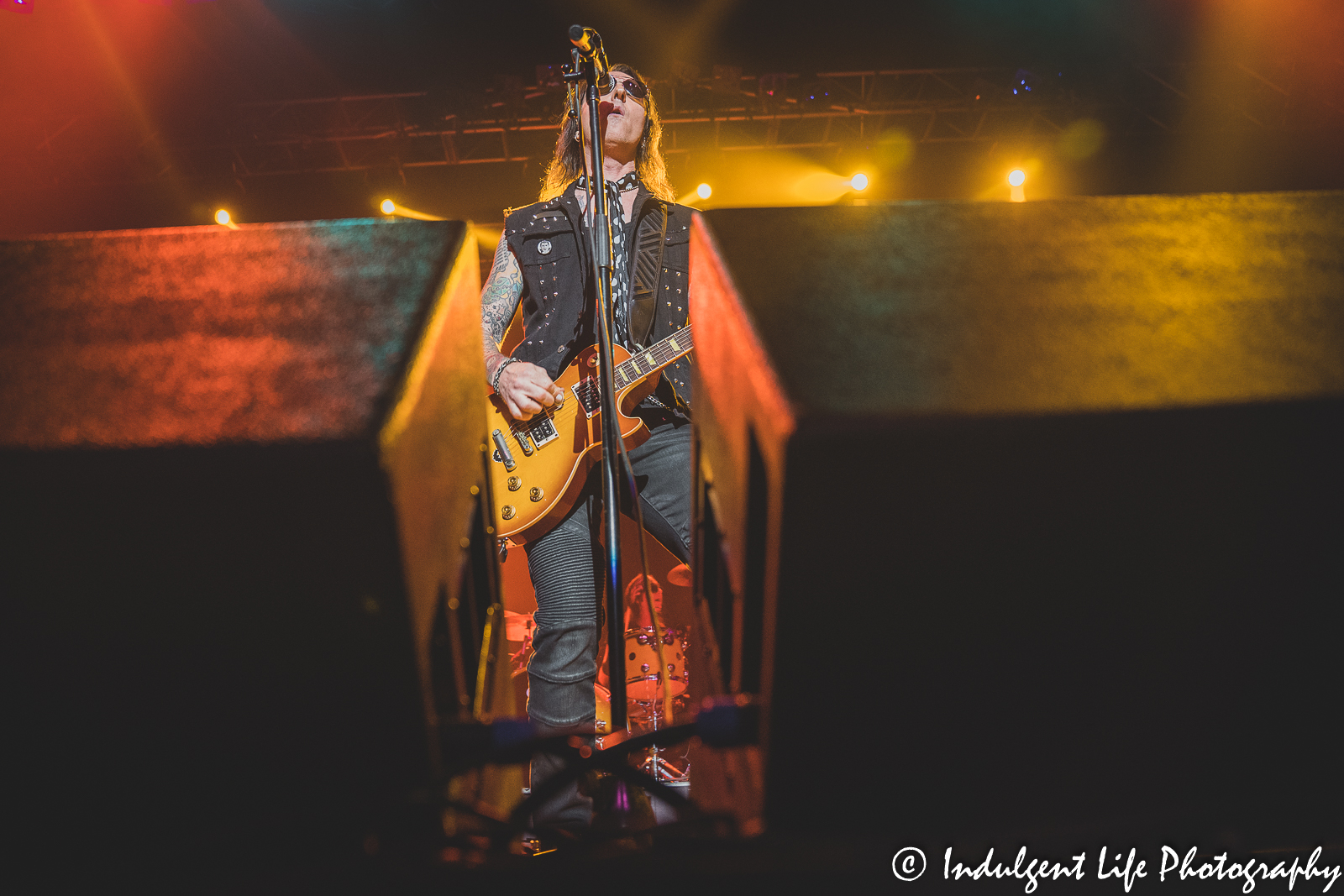 Frontman Kurt Frohlich of Riley's L.A. Guns singing and playing guitar live at Ameristar Casino in Kansas City, MO on October 1, 2021.