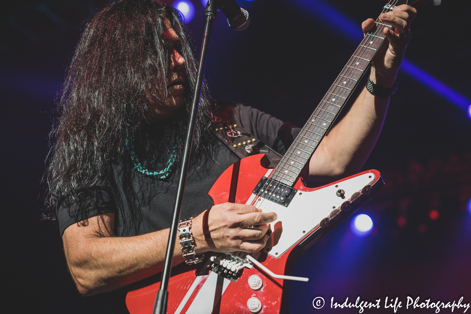 Lead singer Mark Slaughter playing the guitar while in concert with his band Ameristar Casino in Kansas City, MO on October 1, 2021.