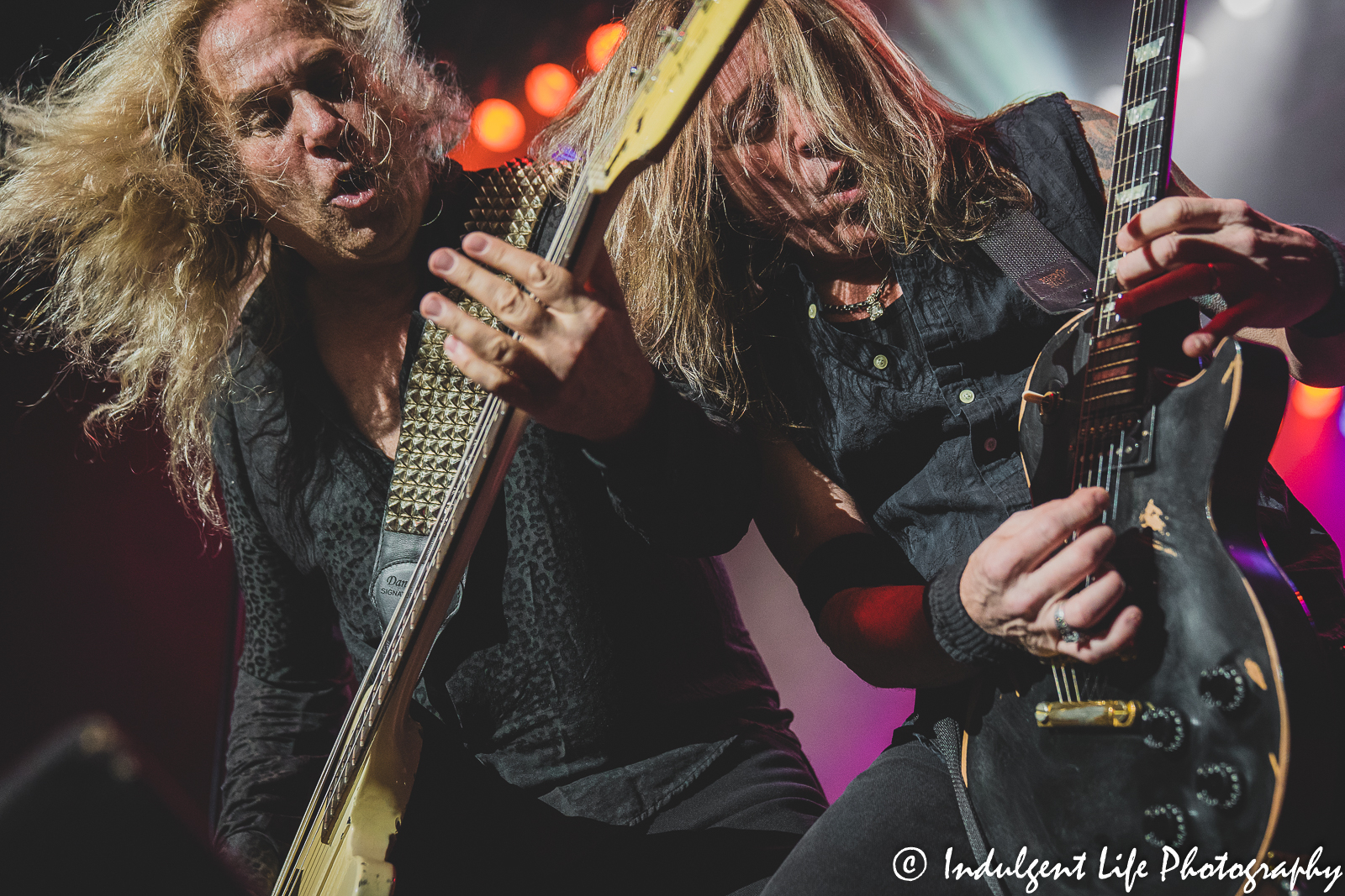 Bass guitar player Dana Strum and lead guitarist Jeff "Blando" Bland playing live together at Ameristar Casino's Star Pavilion in Kansas City, MO on October 1, 2021.