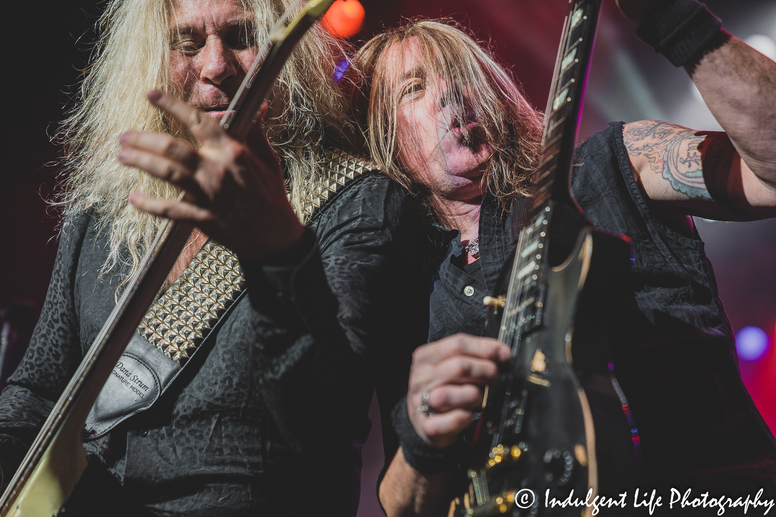 Bass guitarist Dana Strum and lead guitar player Jeff "Blando" Bland live in concert together at Ameristar Casino in North Kansas City, MO on October 1, 2021.