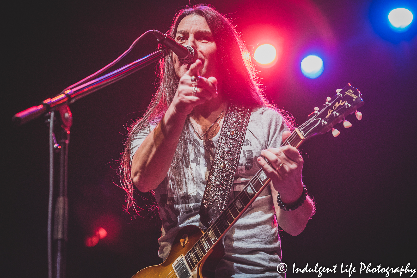 The Guess Who guitarist Michael Staertow pointing to the camera as he performs live at Star Pavilion inside of Ameristar Casino in Kansas City, MO on November 20, 2021.