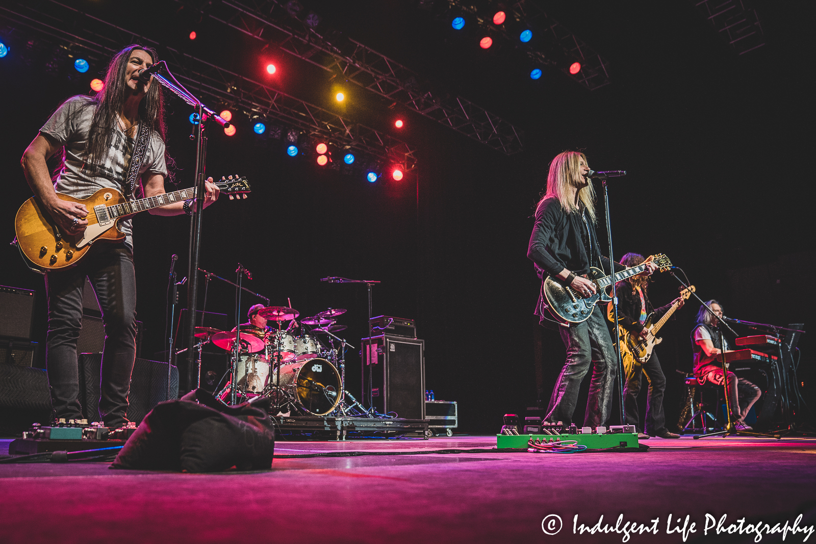 Members of Canadian rock band The Guess Who performing live together at Ameristar Casino's Star Pavilion in Kansas City, MO on December 3, 2021.