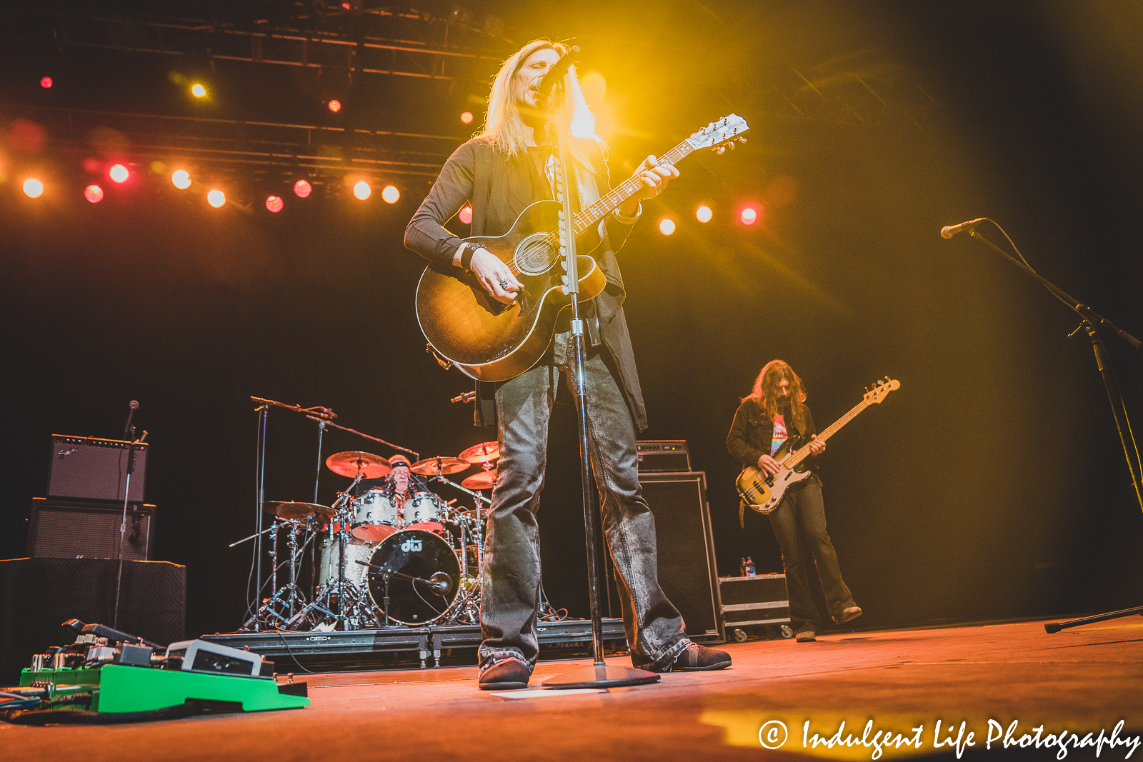 Lead singer Derek Sharp playing the acoustic guitar live at Ameristar Casino's Star Pavilion in Kansas City, MO on November 20, 2021.