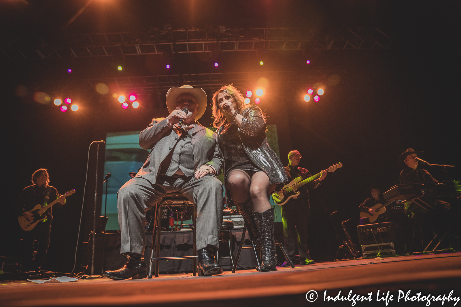 Johnny Lee performing live with his Urban Cowboy band backup singer at Ameristar Casino Hotel Kansas City on November 13, 2021.