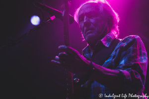 LRB frontman and lead singer Wayne Nelson backlit by purple stage lights at Ameristar Casino's Star Pavilion in Kansas City, MO on January 15, 2022.